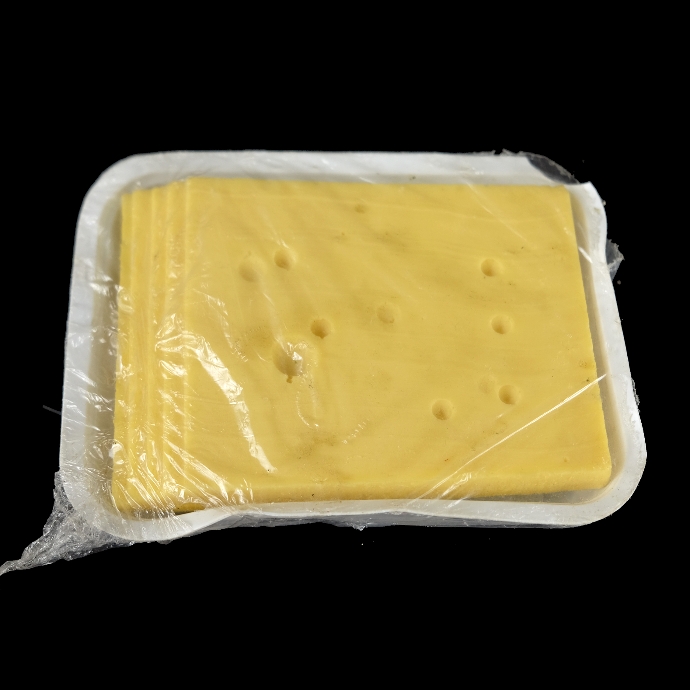 Kunst-Käse in Plastikverpackung